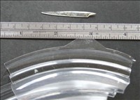 6) Poly Ethylene Terephthalate (PET) shard recovered from foodstuff. see IG #23